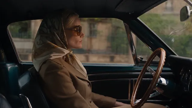 Seedance 2.5 — Cinematic 30-second video of a glamorous blonde woman driving a classic dark-green 1960s Ford Mu